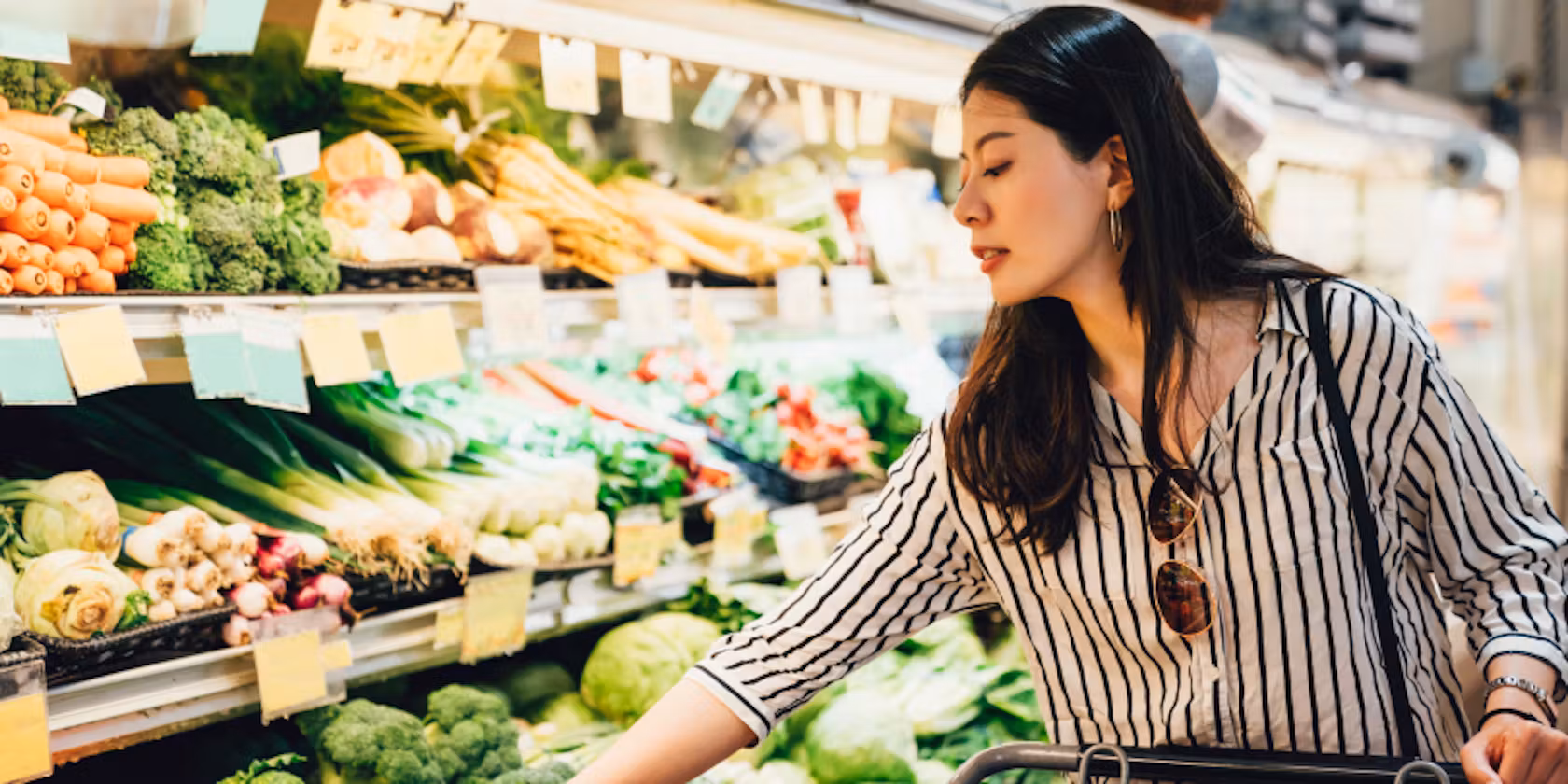 An Asian woman with a striped shirt